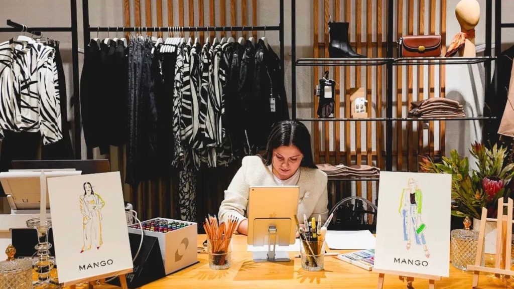 Bárbara Ortiz realizando ilustraciones de moda para Mango. Fotografía cedida por ilustradora